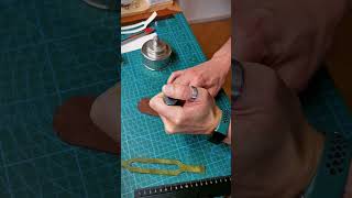 Manual Creasing leather with this tool. Beautiful decorative line on this wristband. Leathercraft