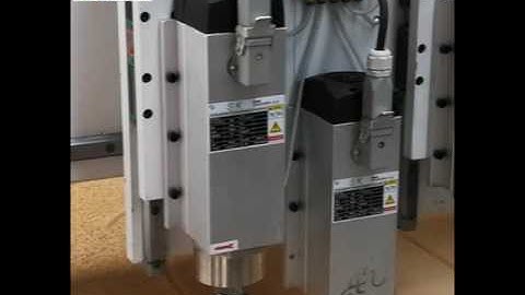 the two heads, 6 spindles, auto changing cnc router