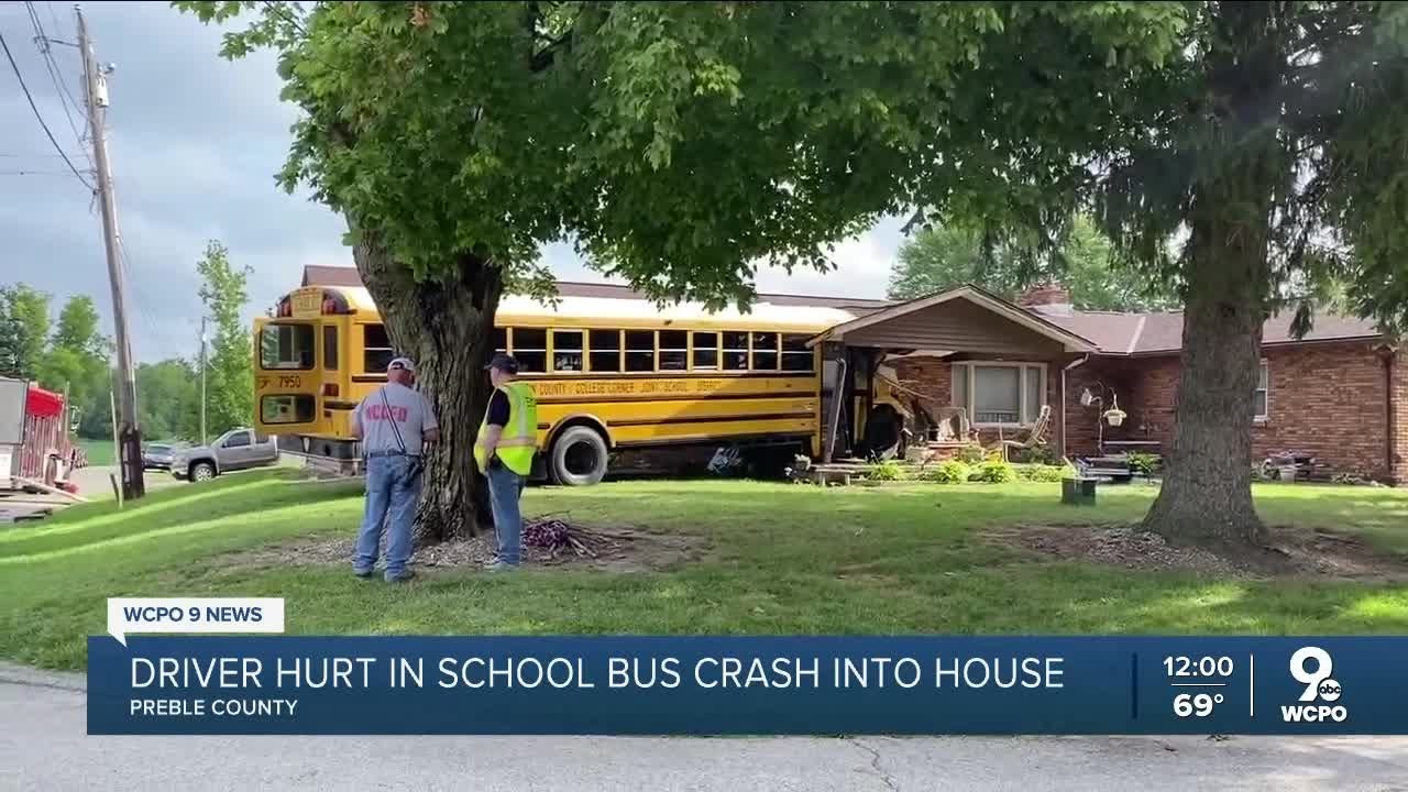 Driver hurt after school bus with 32 students on board crashes into ...