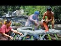 Survival in the rainforest- Mans found crocodile at waterfall for eat with women -Eating delicious