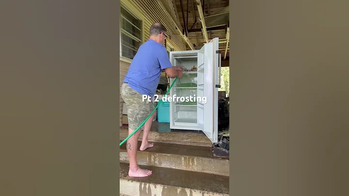 Defrosting a freezer with a  garden hose. #farmlife  #defrosting #defrost #shorts