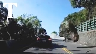 Taiwan earthquake: desperate motorists dodge boulders