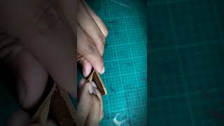 Precision gluing and assembly—every detail matters. #LeatherCraft #HandmadeWallet #LeatherWorking