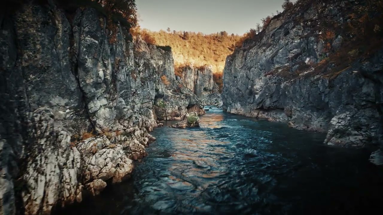 4k view of the borselva river flowing in the deep gorge of the silfar canyon, norway