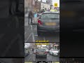 Police dashcam shows stolen car racing through red lights and around an ambulance in Manchester c...
