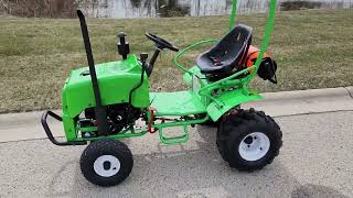 Mini Scamp Farm Tractor From SaferWholesale With Optional Trailer, Sprayer & More