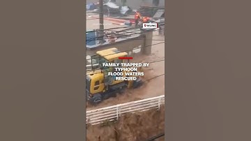 Family trapped by typhoon flood waters rescued