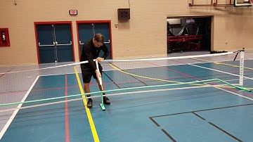 Setting up Pickleball net