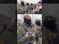 Border patrol agent hugs woman day after fatal ICE shooting