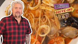 Guy Fieri Eats the 'Seafood Buffet for 90' in Baltimore | Diners, DriveIns and Dives | Food Network