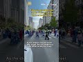 Kids run straight into traffic officer's arms when crossing road