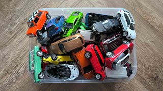 Taking Toy Cars Out of The Box andShowing Them in Hands With Their Interrior