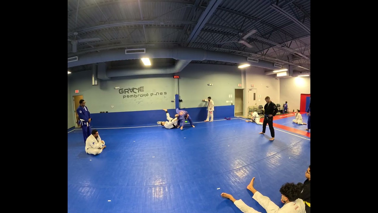 Guard pull to de la Riva to deep de la Riva sweep