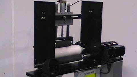 Semi-Automatic wrap labeler w/ Label-Aire from QLC