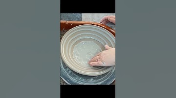 Adding colored slip to a pottery bowl 🥣