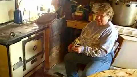 Jackie Clay - Cleaning the wood cook stove