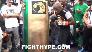 FLOYD MAYWEATHER DISPLAYS POWER AS HE BANGS THE HEAVY BAG IN PREPARATION FOR MANNY PACQUIAO