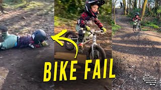 Little Boy Wearing Protective Gear Falls of His Bike