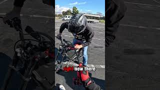 Teaching Sun Hat Kid how to wheelie an E Bike #losangeles #raw #shorts