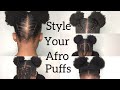 5 quick, cute and easy ways to style your Afro puffs.