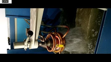 Induction hardening machine with CNC quenching machine tool