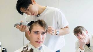 British Students shave their heads for Korean Military Service image