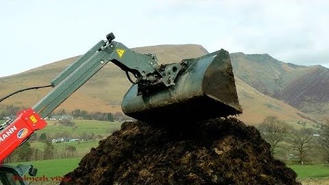 Muck-Loading in the Lakes!  Weinemann action with Massey! Stunning scenery!