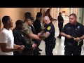 teens handcuffed and escorted to jail