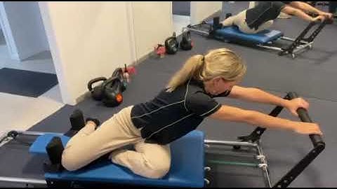 Pilates reformer - seated thoracic rotation stretch