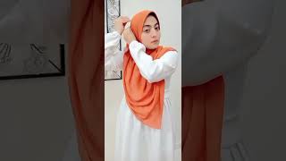 لفه الخمار المثلث....🧡🌼