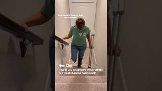 How do you go up stairs with crutches non weight bearing using a handrail?
