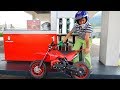 Funny Baby Ride on New Dirt Cross Bike Mini Power Wheel Pocket Bike Fuel Station