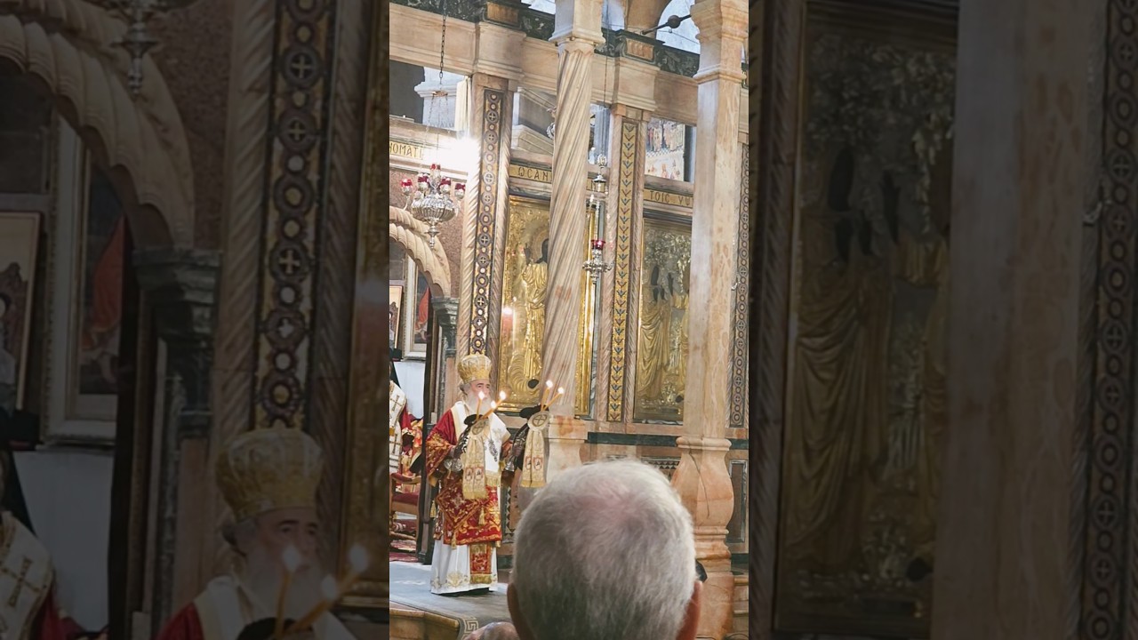 Patriarch of Jerusalem Theofilos blessing the faithful in Jerusalem 