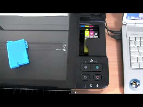 How to Change Ink Cartridges with a Epson Stylus SX125