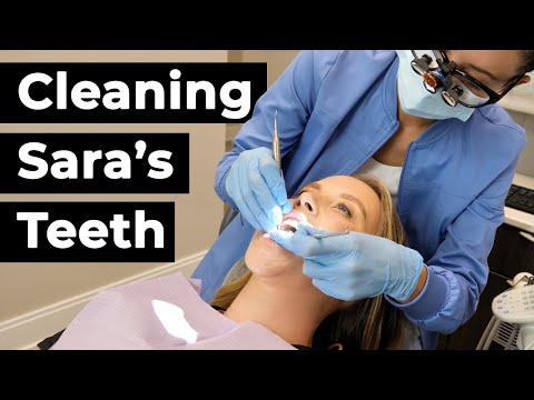 Dental Hygienist Cleans Another Dental Hygienist's Teeth