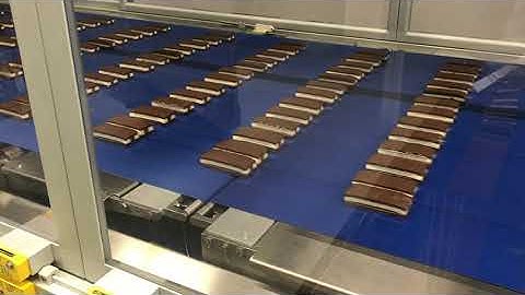 Flow wrapping full automatic, row removal and auto top load cartoning.