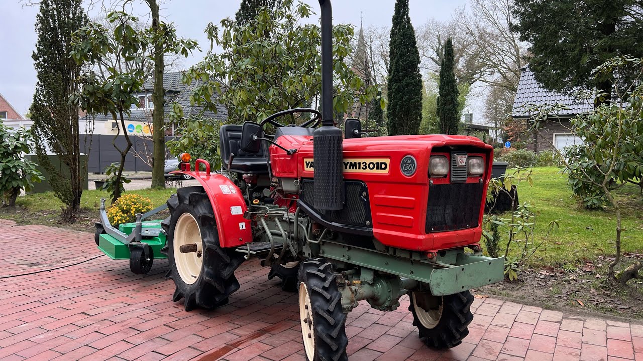 Yanmar YM1301 compact tractor with sickle mower, 4x4 all-wheel