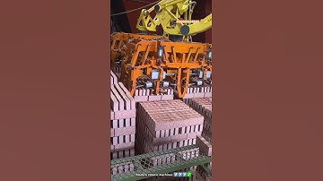 Modern robotic hand loading bricks in manufacturing 💫