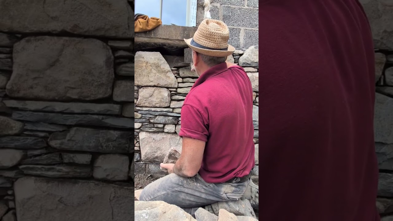 Reclaimed stone barn built with a dry joint.mostly limestone 