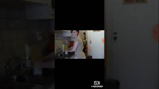 Girl gets pantsed while washing dishes 
