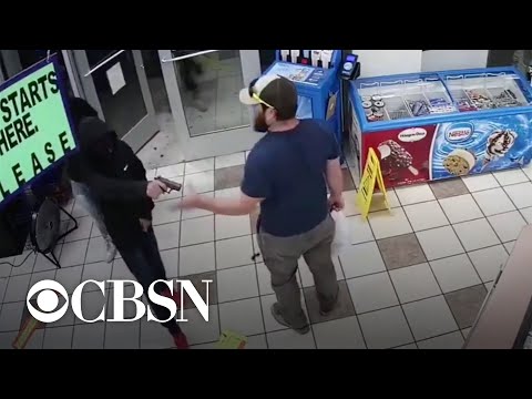 Marine caught on video swiftly disarming robbery suspect