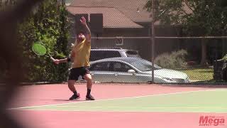 Fall Out Boy bassist Pete Wentz sports long blonde hair while playing tennis