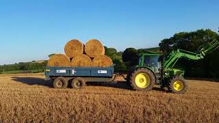 Murray bros loading straw etc with Manitou  loaders