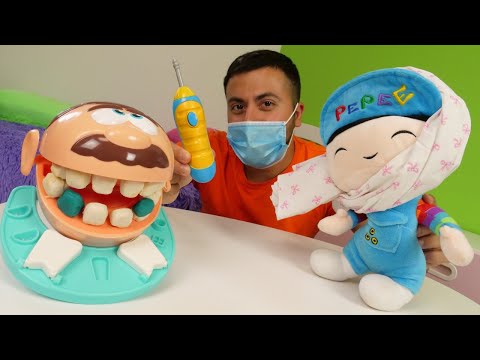 Play Doh oyun videosu. Pepee doktora gidiyor - Dişçi seti ile oynuyoruz! Çocuklar için