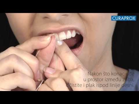 Video: Kako očistiti zube koncem: 14 koraka (sa slikama)