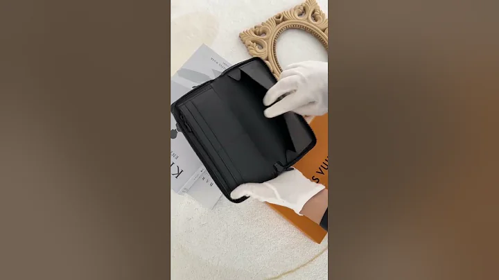 LOUIS VUITTON M62902 黑壓紋直式拉鏈長夾