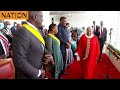 First Lady Margaret Kenyatta walks past DP Ruto and his wife Rachel