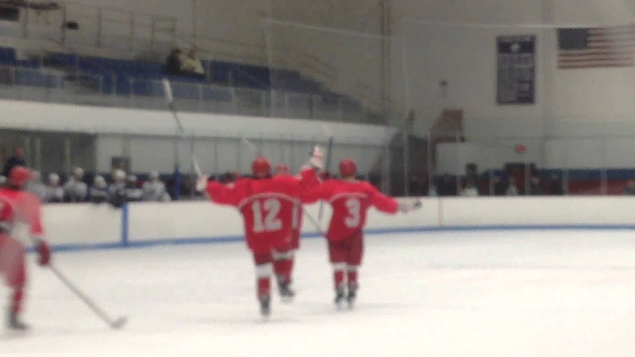 Ben Wosky scores for East Longmeadow hockey against West Springfield