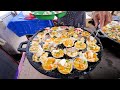 Asian Street Food - CRISPY GRIDDLE CAKES! | Night Market Food Tour in Satun, Thailand!