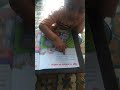 Reading by the junior kg student Muhammad Hassan at home(2)